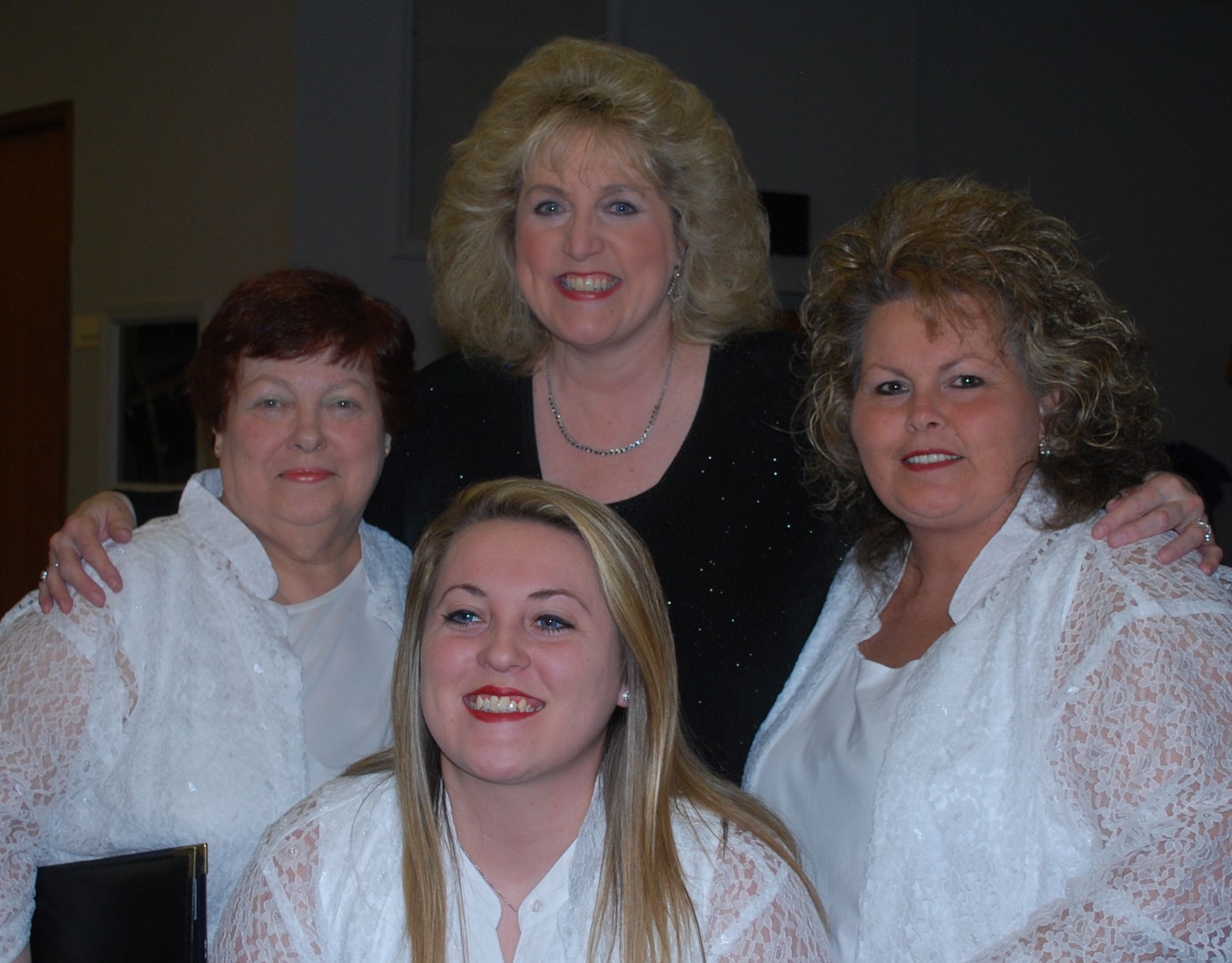 Image - Mary McDonald with choir members in 2015